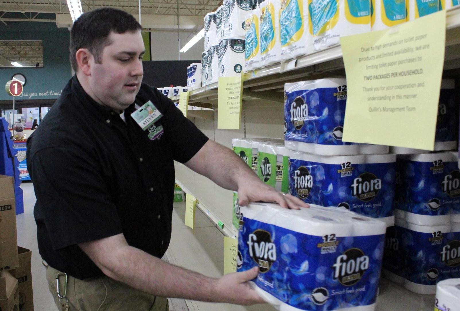 Steve stacks toilet paper